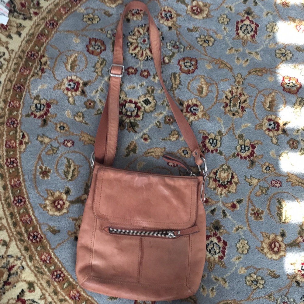 Tan colored fossil bag.